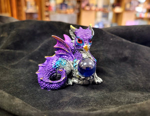 Baby Dragon with Globe